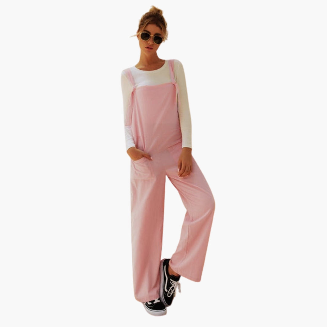 Tuta donna con spalline larghe e tasche anteriori