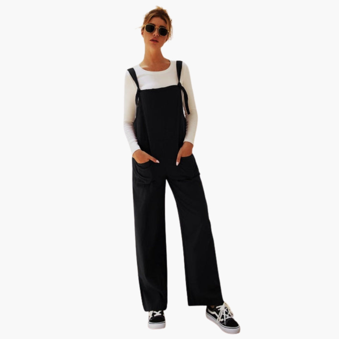 Tuta donna con spalline larghe e tasche anteriori