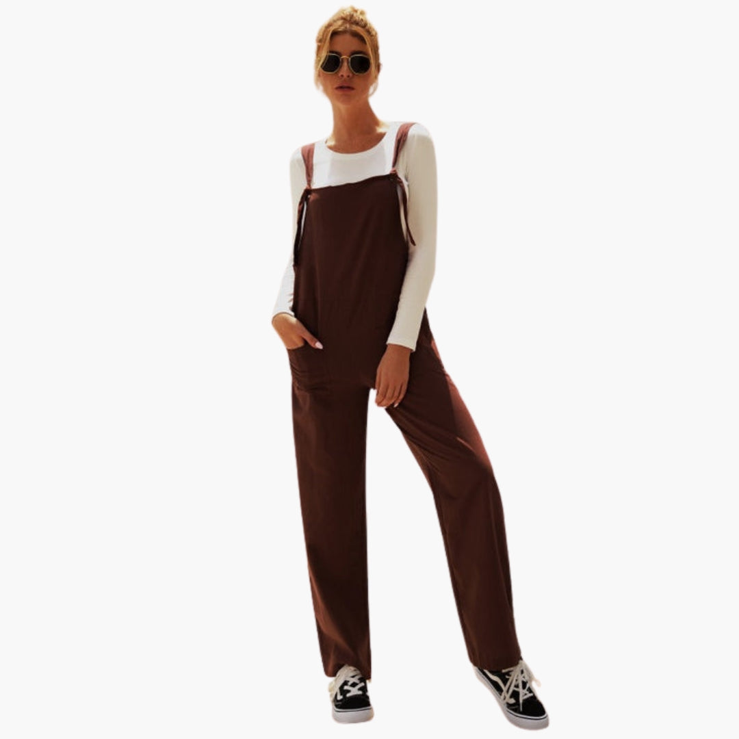Tuta donna con spalline larghe e tasche anteriori