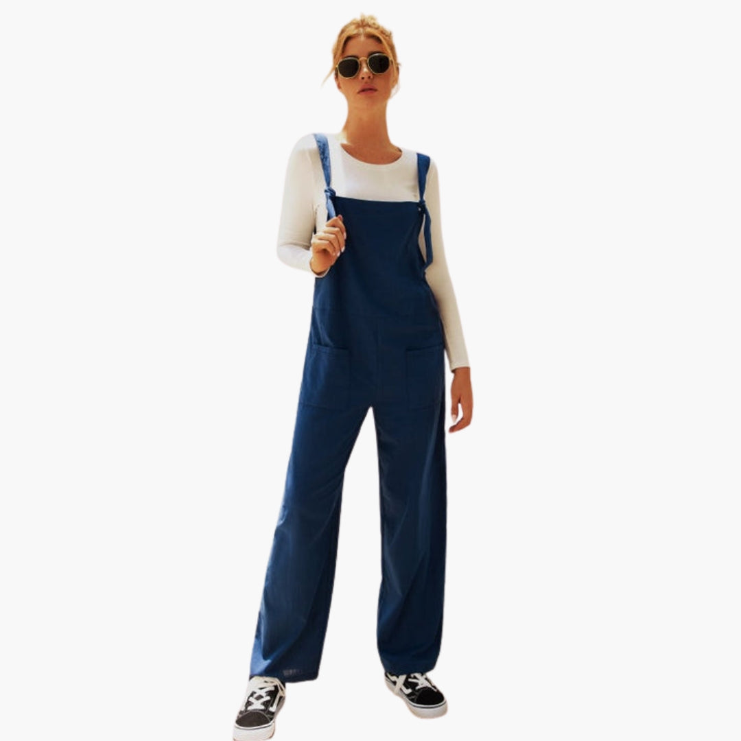 Tuta donna con spalline larghe e tasche anteriori