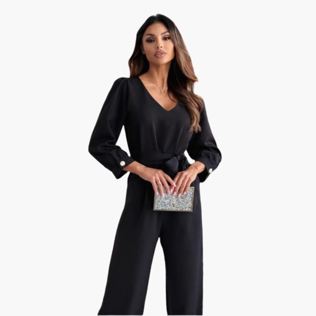 Combinaison femme avec col en V et ceinture à la taille