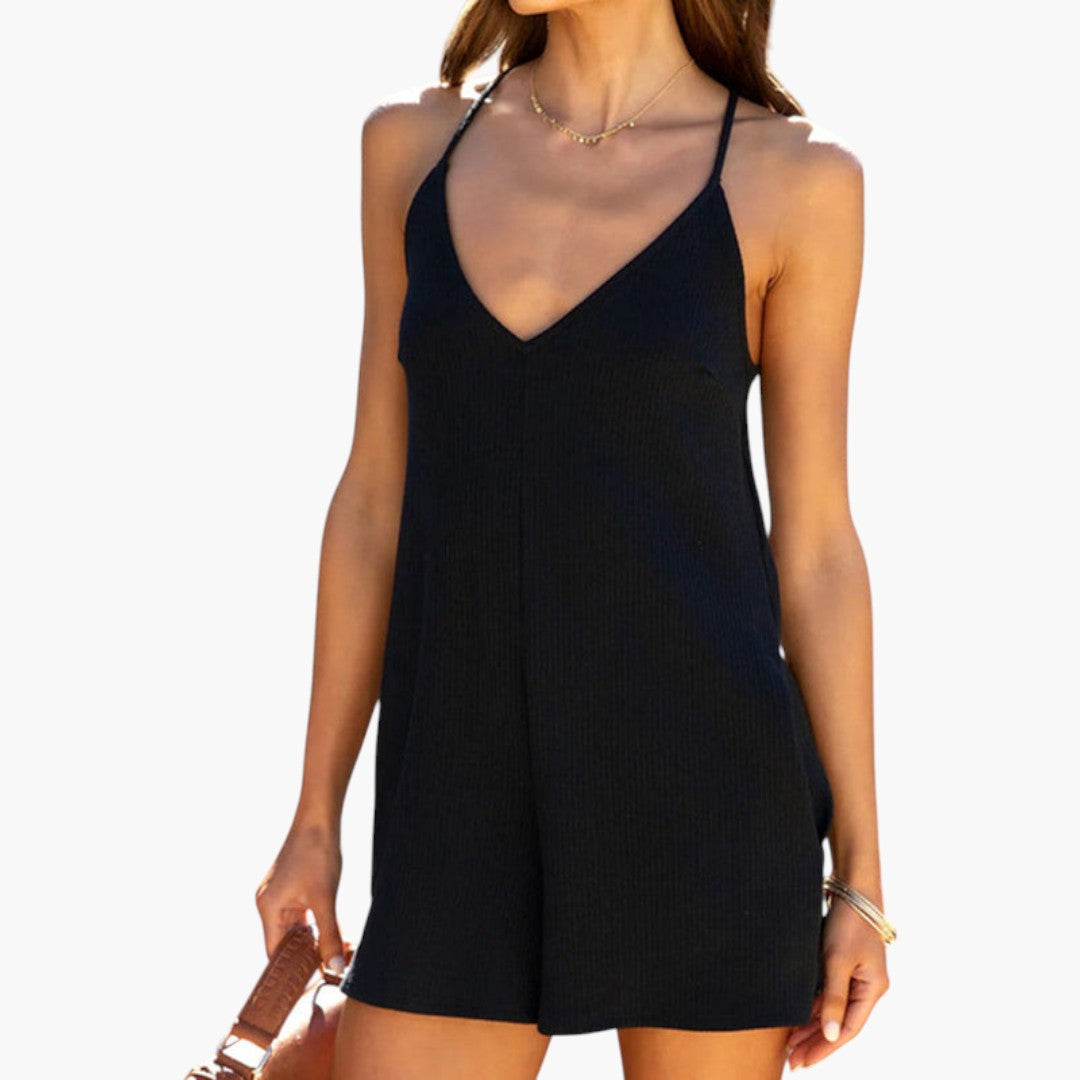 Short women's jumpsuit with V-neck and side pockets