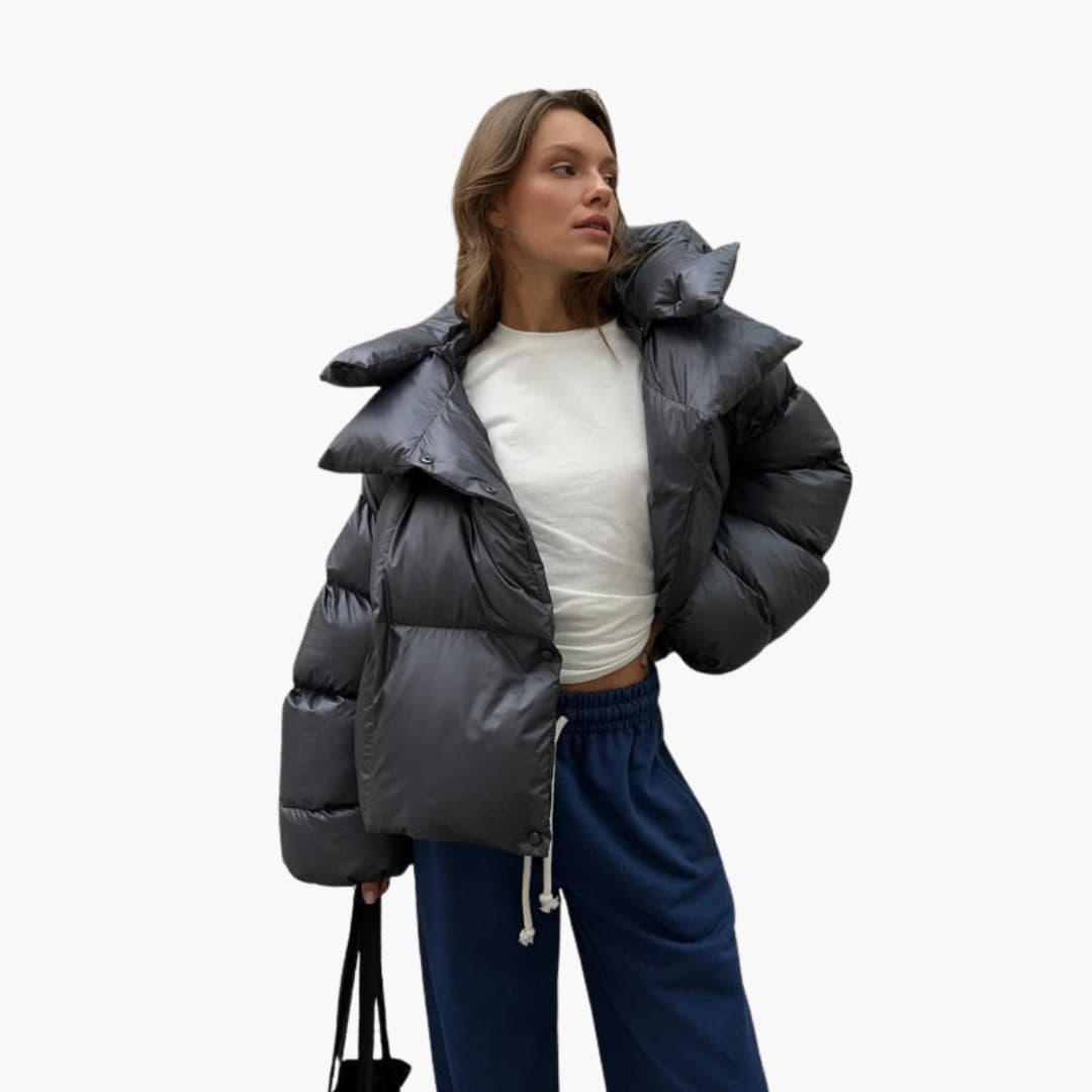 Glänsande damdunjacka med tjock vaddering och voluminös passform