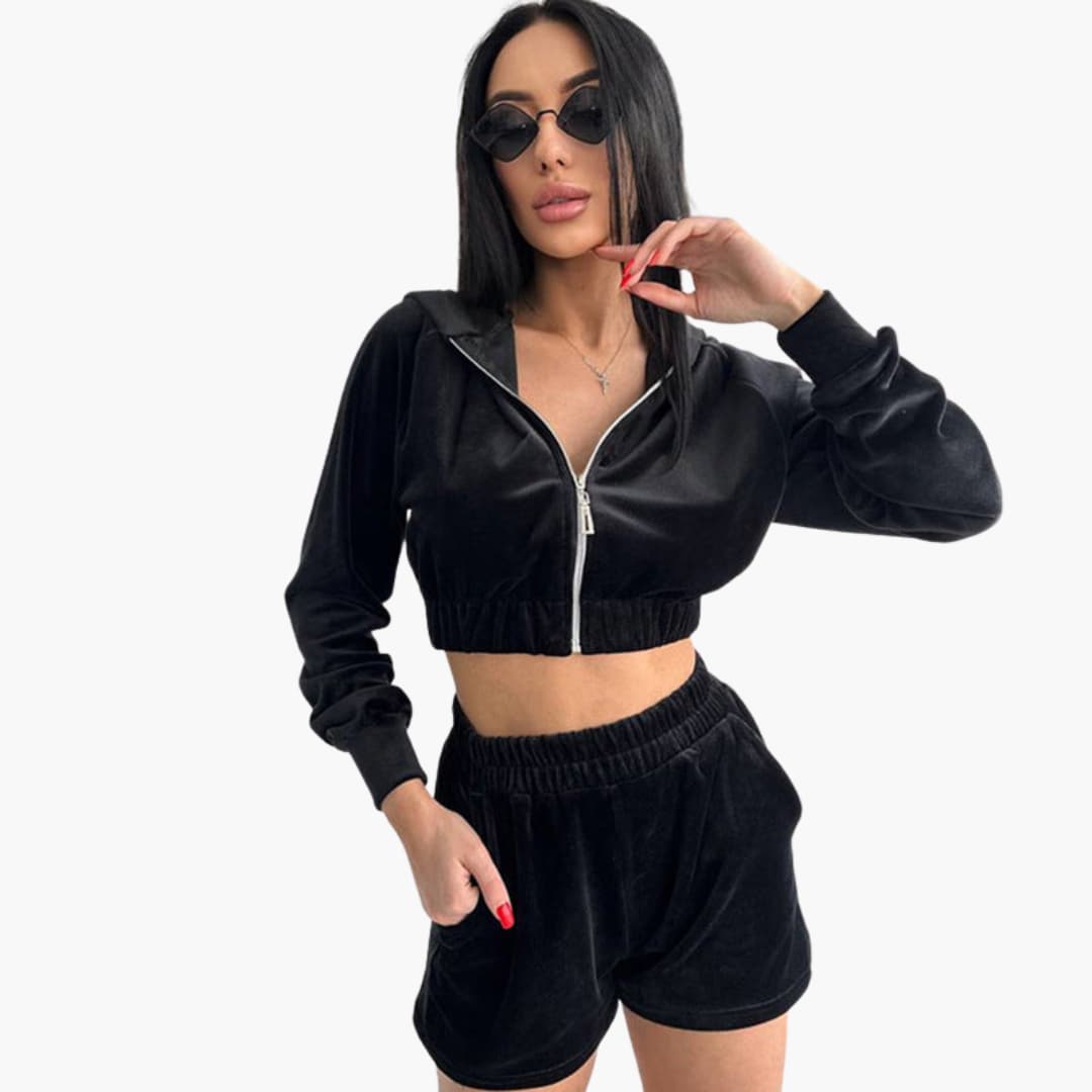 Completo sportivo donna con chiusura frontale a zip e vita elasticizzata