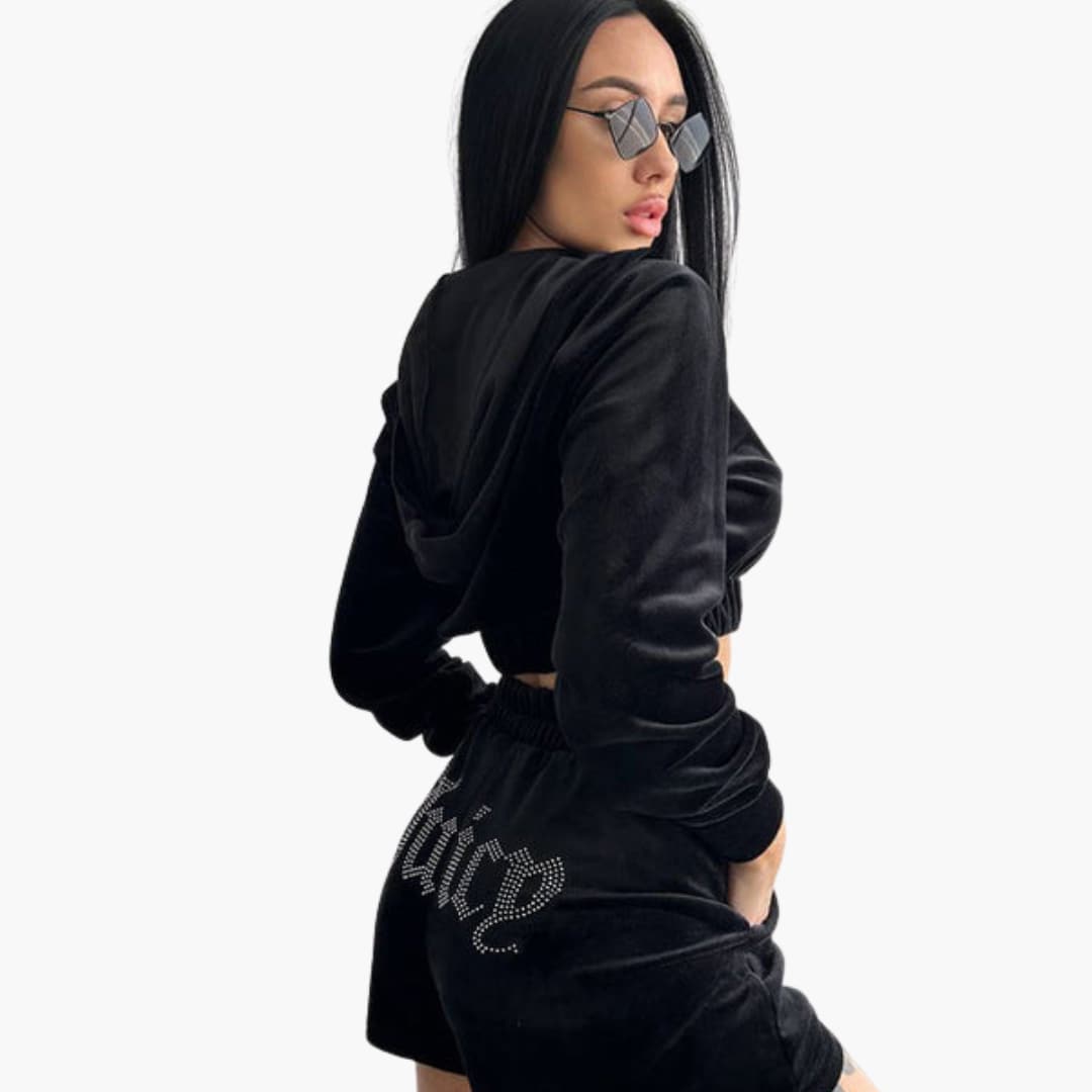 Completo sportivo donna con chiusura frontale a zip e vita elasticizzata