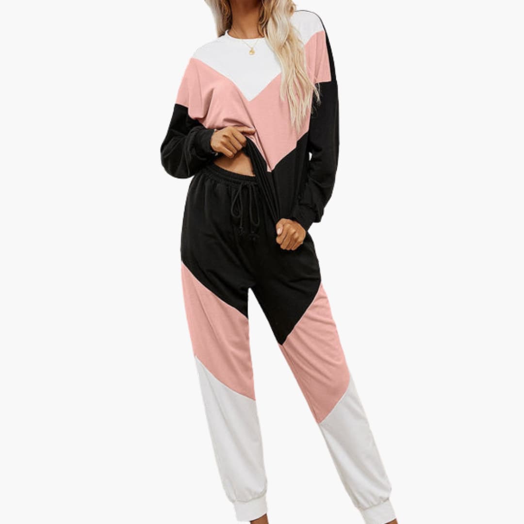 Completo sportivo donna con top a pannelli a contrasto e pantaloni con vita elastica