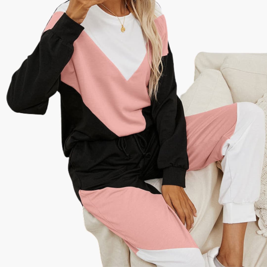 Completo sportivo donna con top a pannelli a contrasto e pantaloni con vita elastica