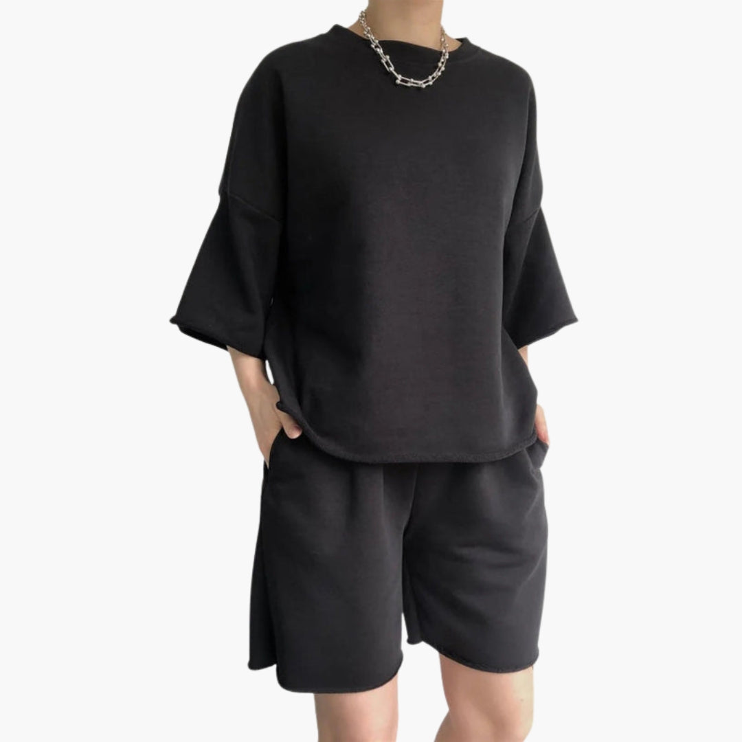 Completo sportivo donna con top corto e pantaloncini con coulisse