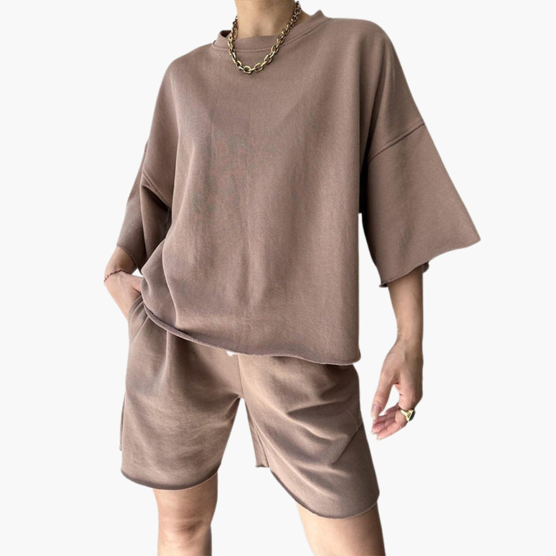 Completo sportivo donna con top corto e pantaloncini con coulisse