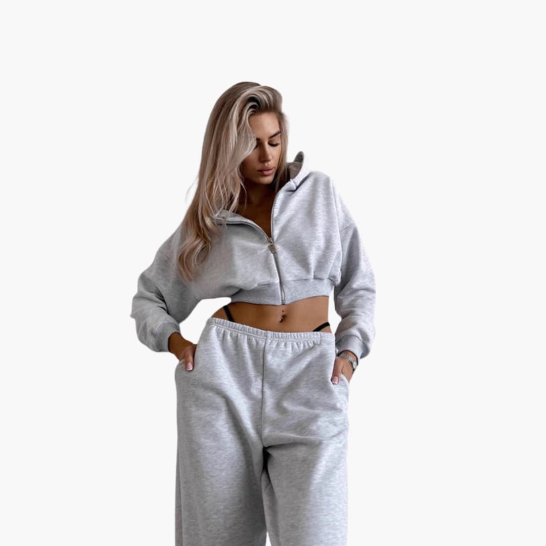 Completo sportivo donna con felpa corta con cappuccio e pantaloni a vita elastica