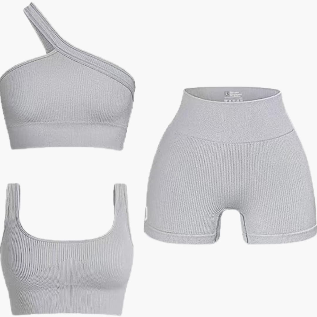 Completo donna due pezzi con top asimmetrico e pantaloncini a vita alta