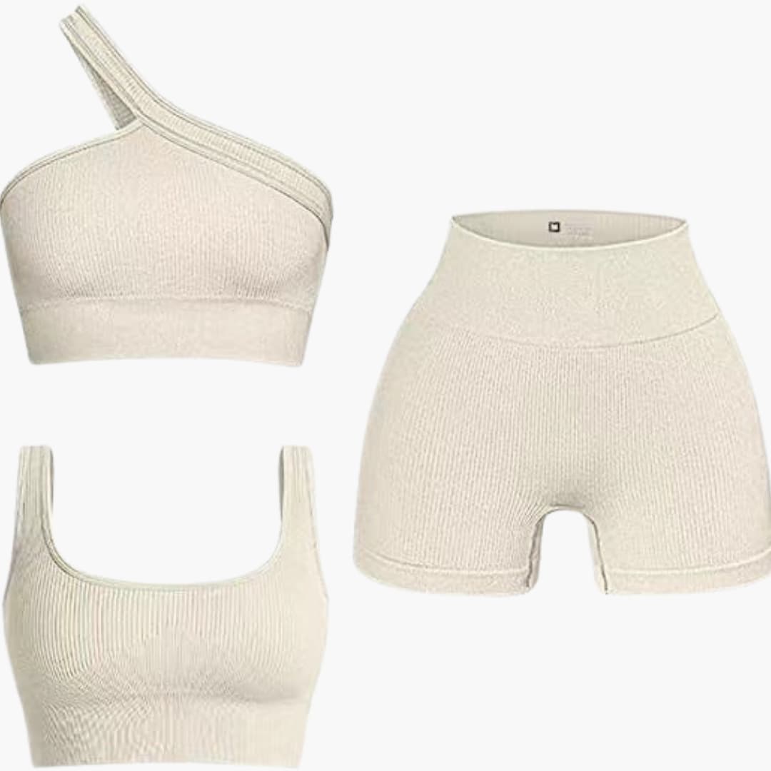 Completo donna due pezzi con top asimmetrico e pantaloncini a vita alta