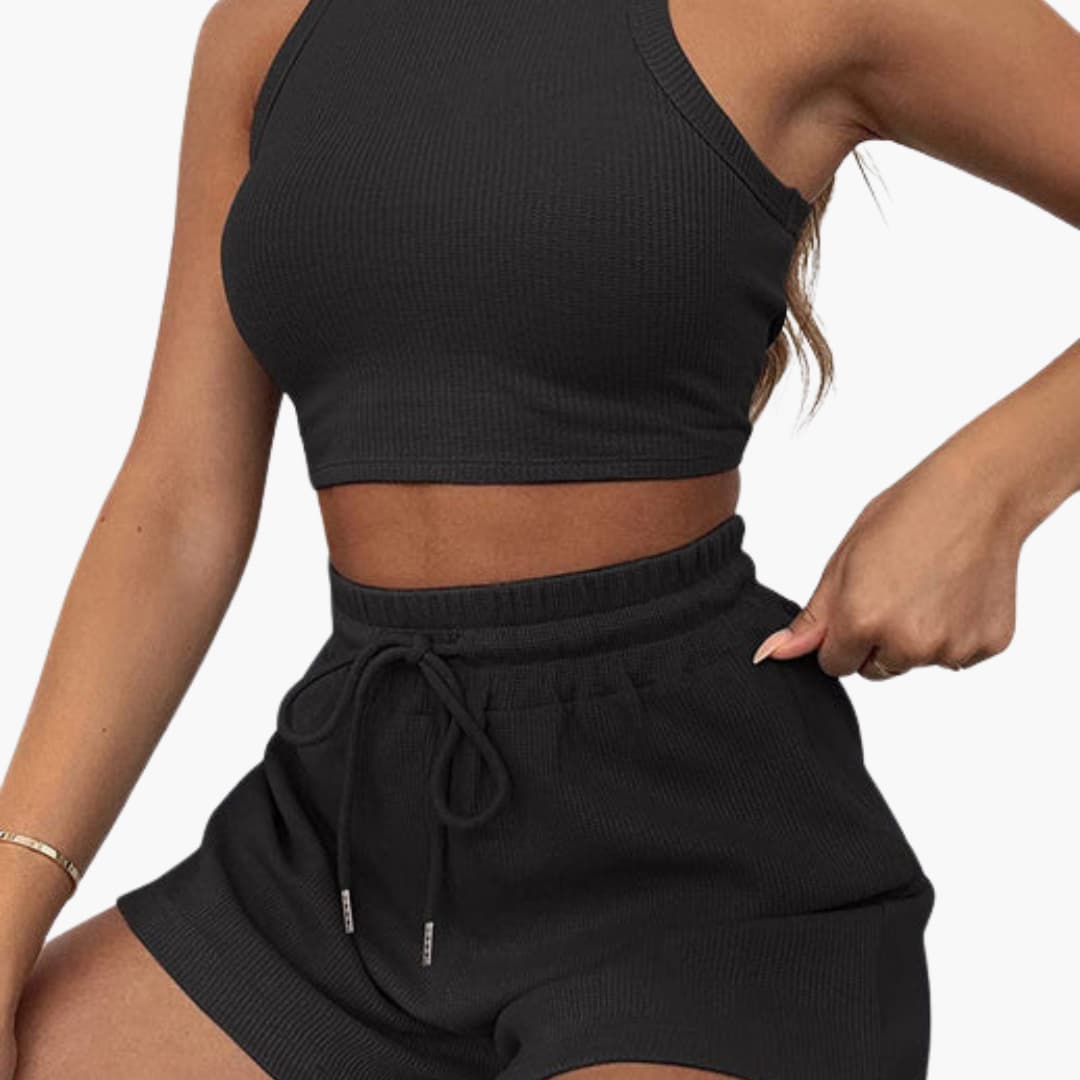 Completo sportivo donna con top a schiena scoperta e pantaloncini
