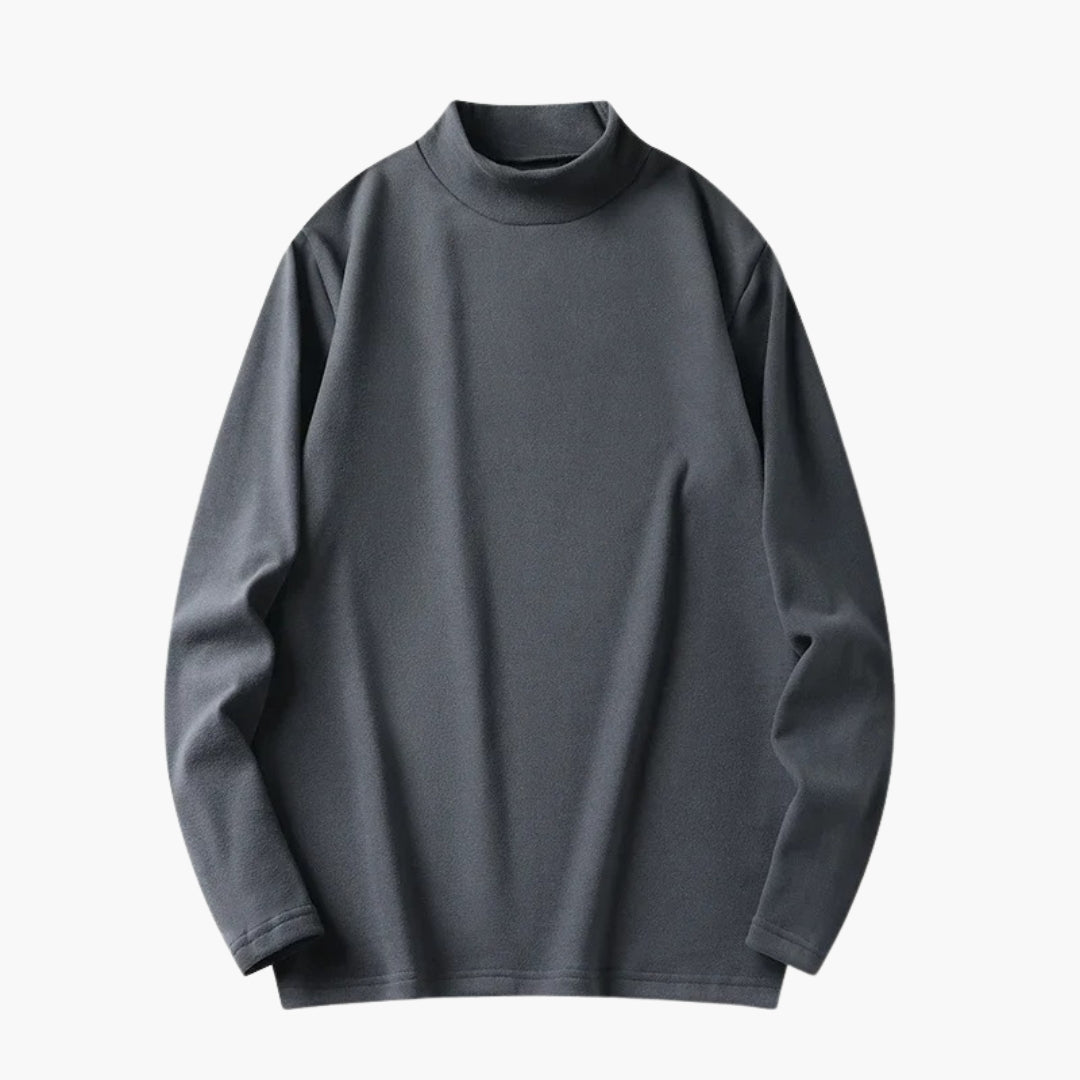 Damebluse med høj hals og lange ærmer