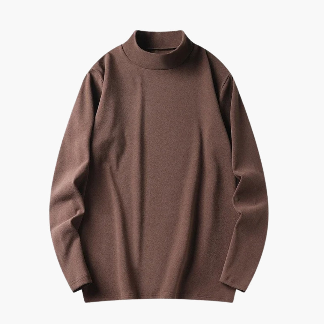 Damebluse med høj hals og lange ærmer