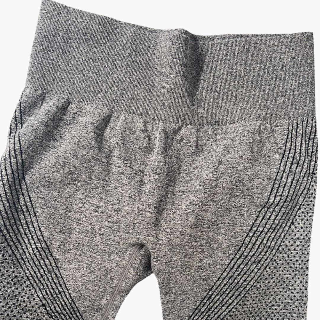 Legging desportivo para mulher de cintura alta com painéis vazados e design sem costuras