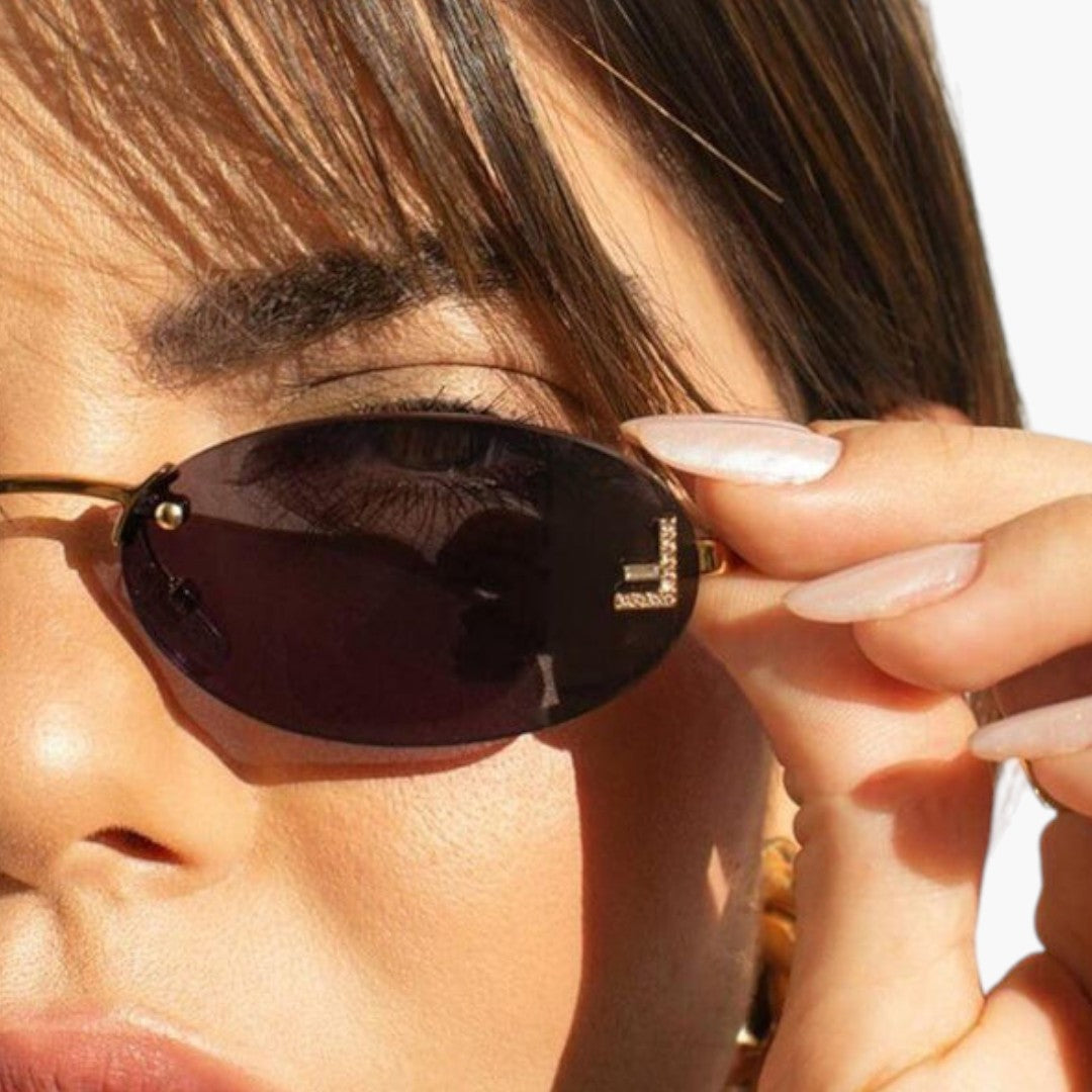Lunettes de Soleil Femme avec Verres Ovales et Monture Sans Contour