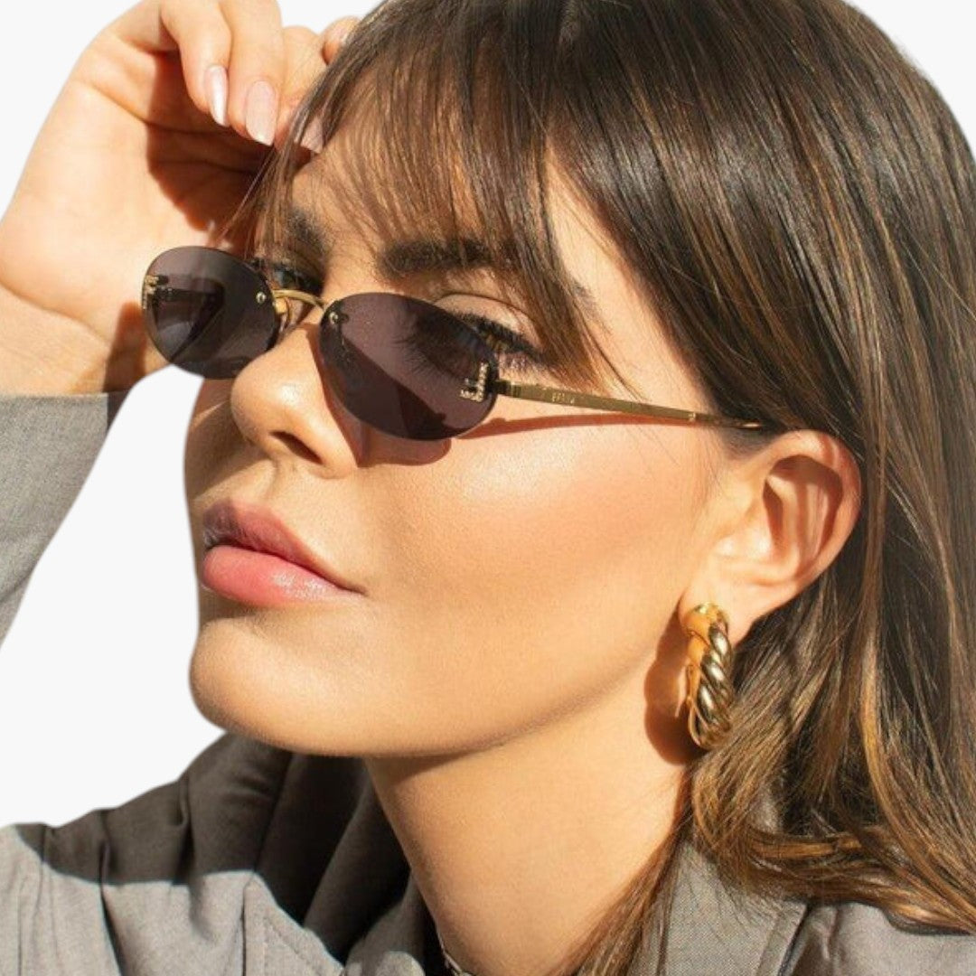 Lunettes de Soleil Femme avec Verres Ovales et Monture Sans Contour