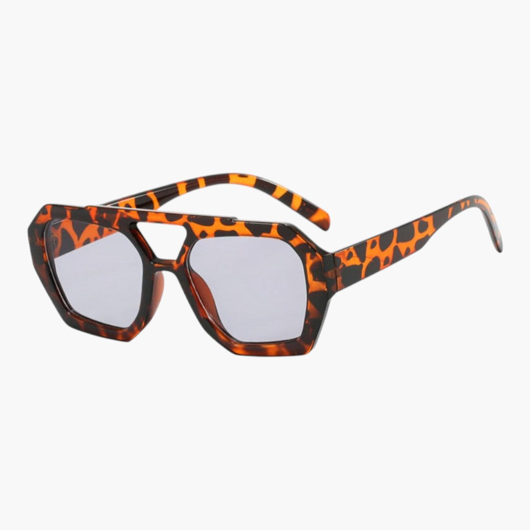 Lunettes de soleil femmes avec monture géométrique et verres teintés
