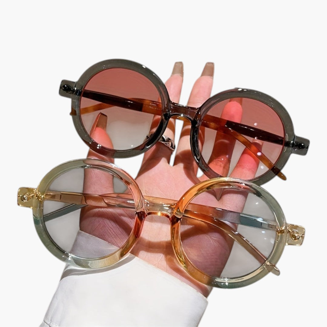 Women's sunglasses with round frame and wide temples
