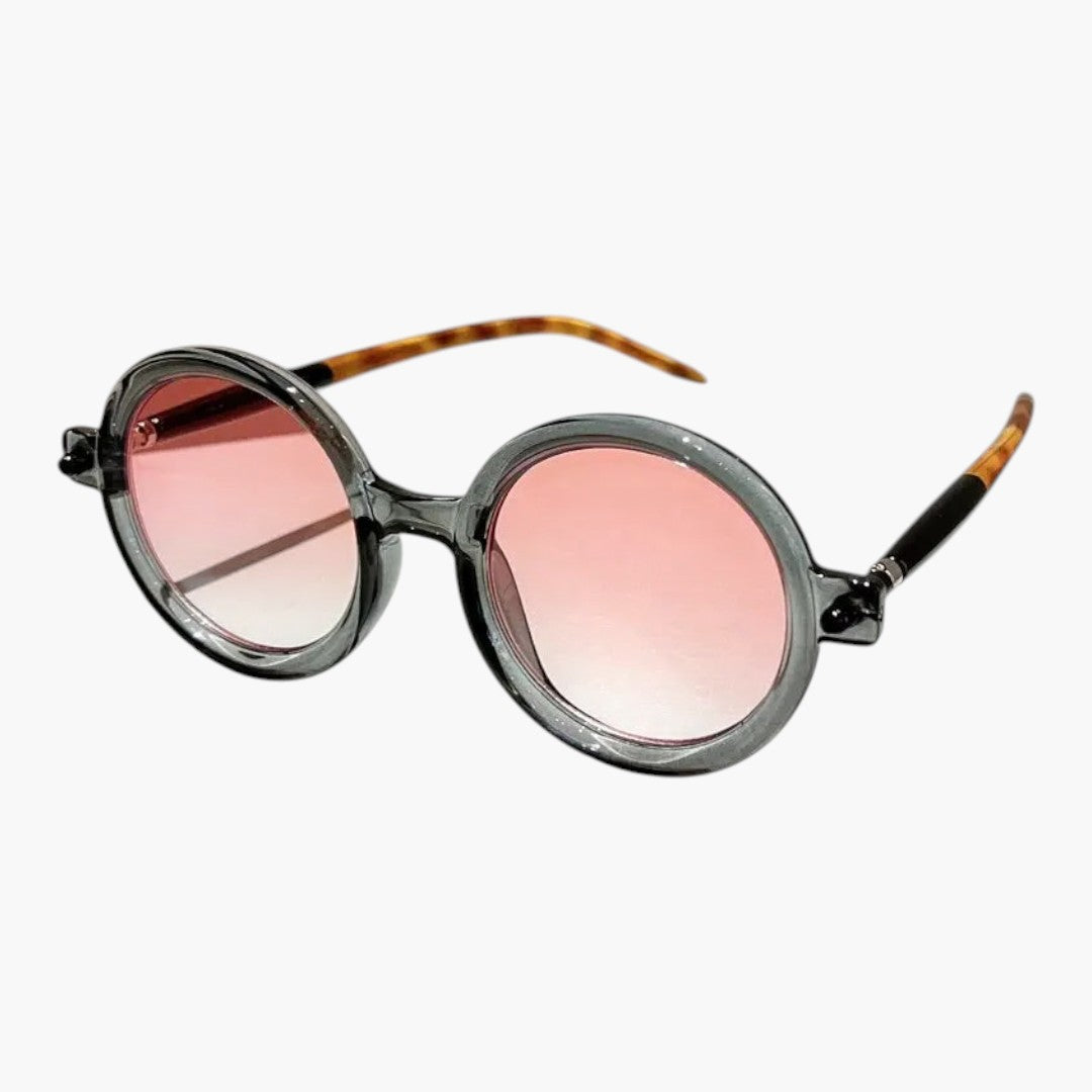 Women's sunglasses with round frame and wide temples