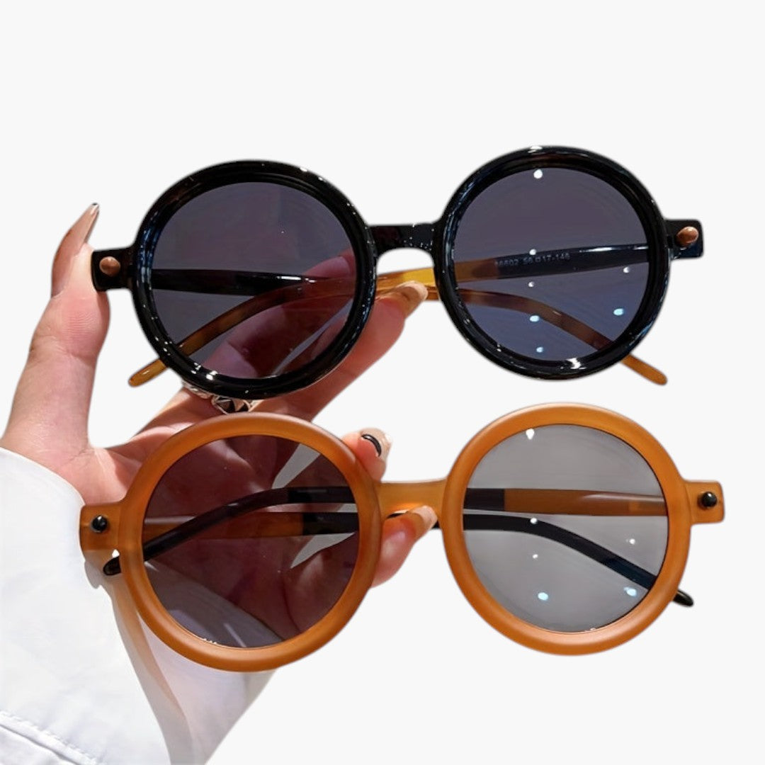 Women's sunglasses with round frame and wide temples