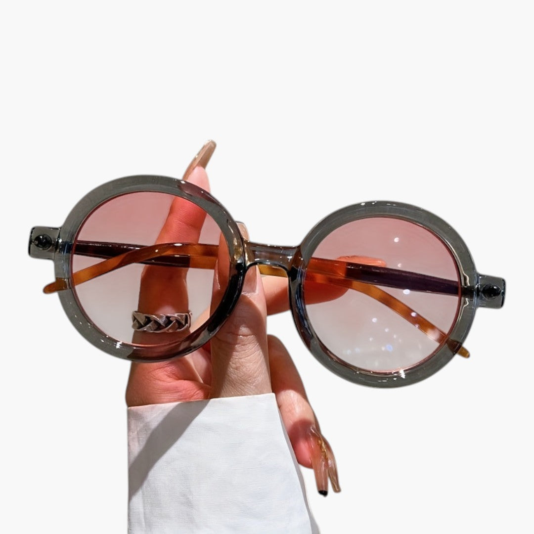 Women's sunglasses with round frame and wide temples