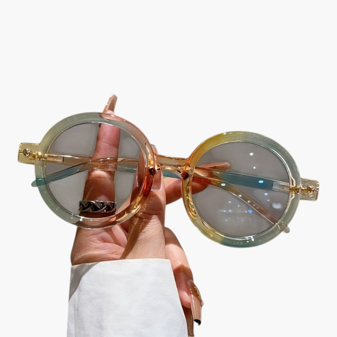 Women's sunglasses with round frame and wide temples