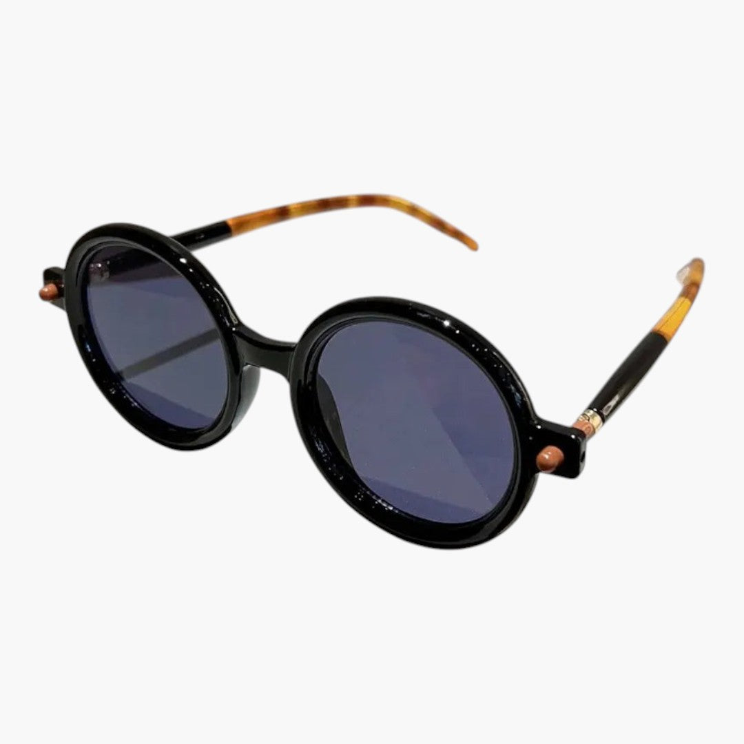 Women's sunglasses with round frame and wide temples