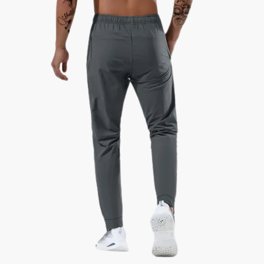 Pantalon de sport homme avec poches zippées