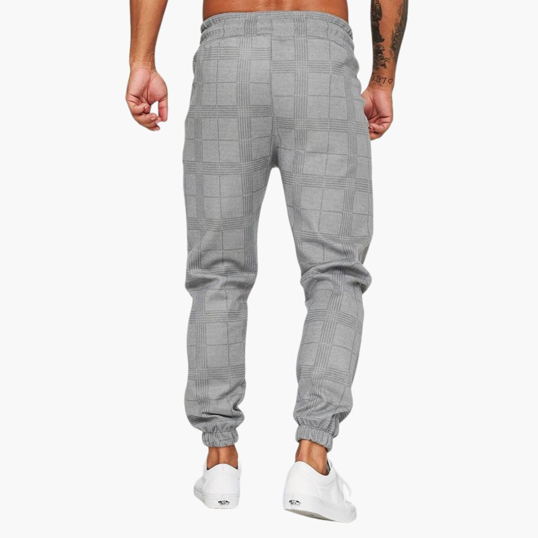 Pantalon jogger homme à carreaux avec poches latérales