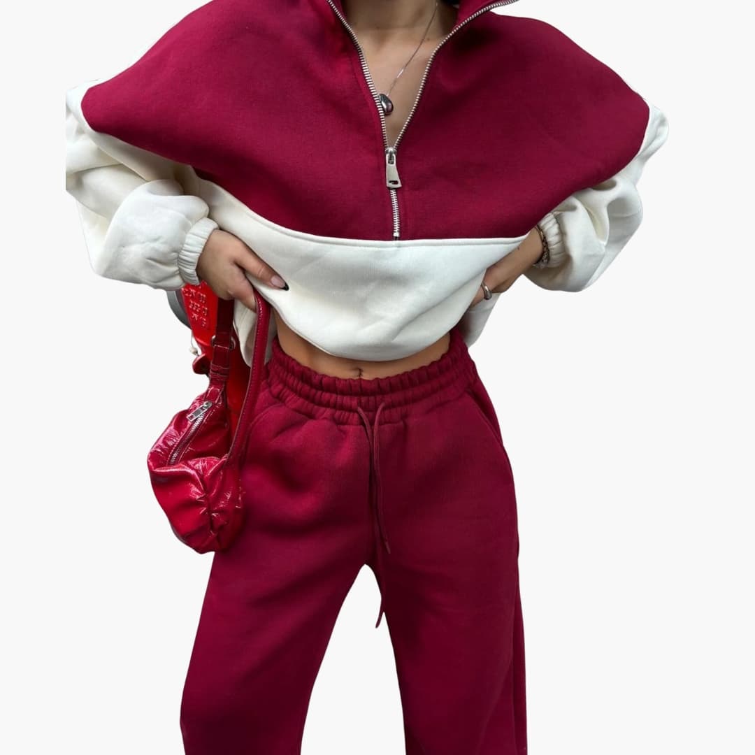 Sudadera bicolor para mujer con media cremallera y hombros caídos