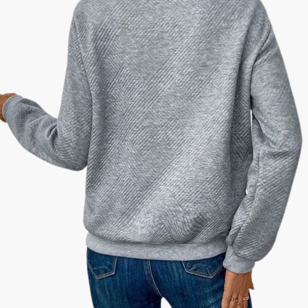 Suéter de mujer con cuello asimétrico y botón decorativo