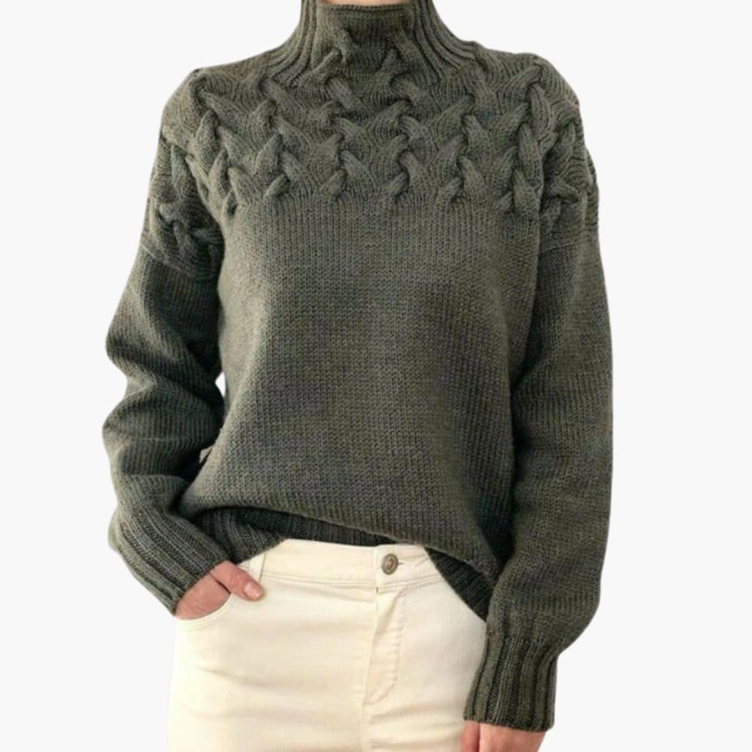 Jersey de mujer con cuello alto y trenzas tejidas