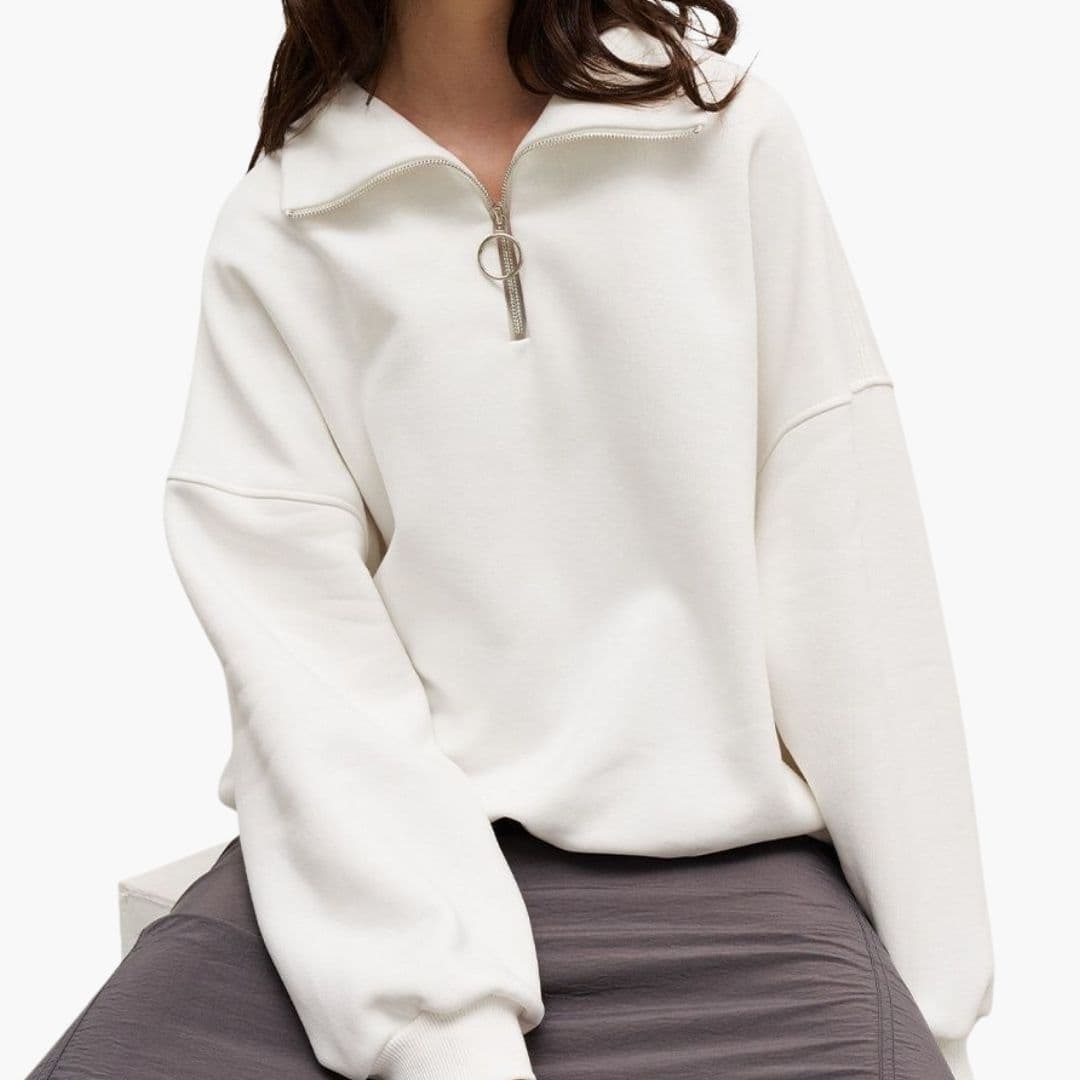 Pull femme à col montant et fermeture zippée