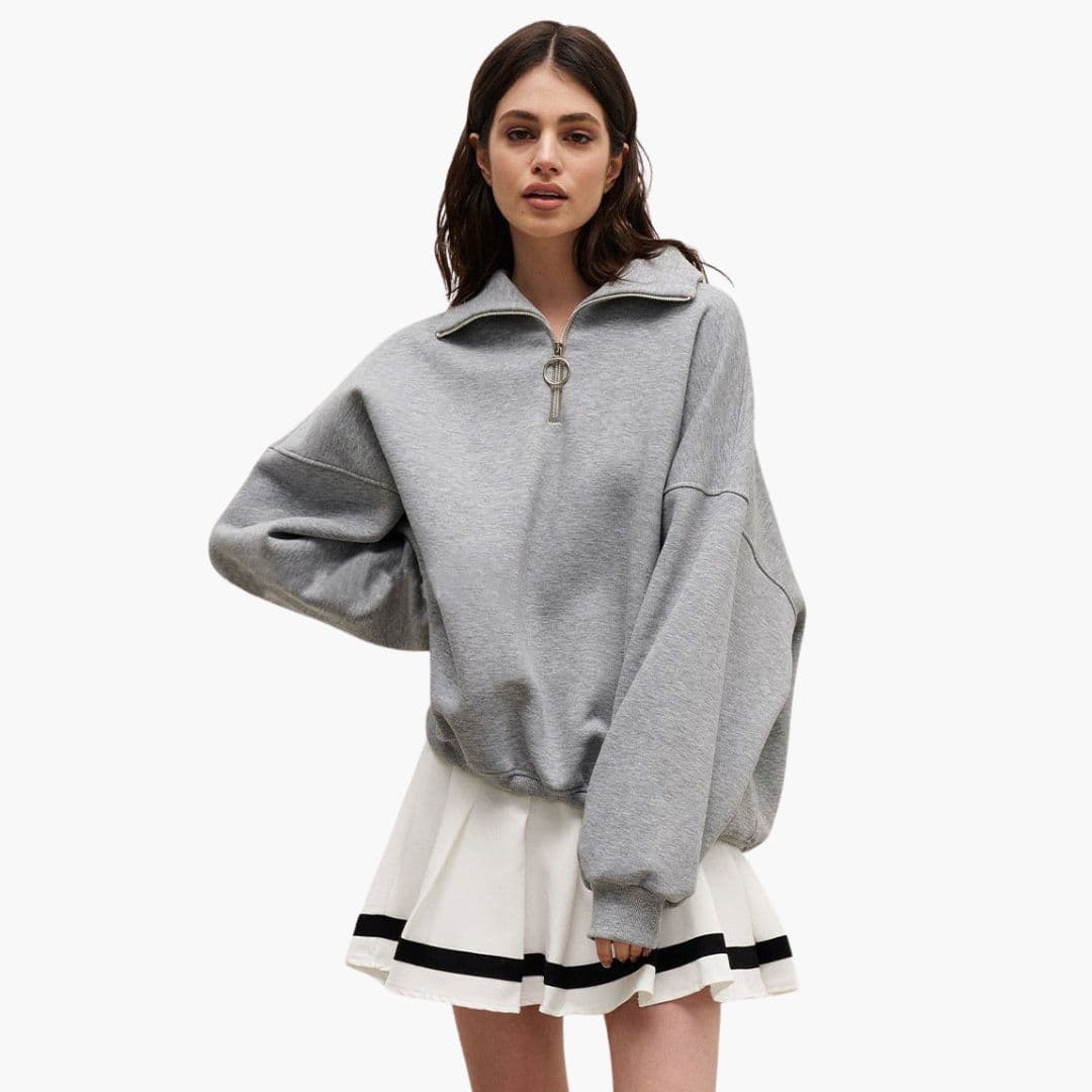 Pull femme à col montant et fermeture zippée