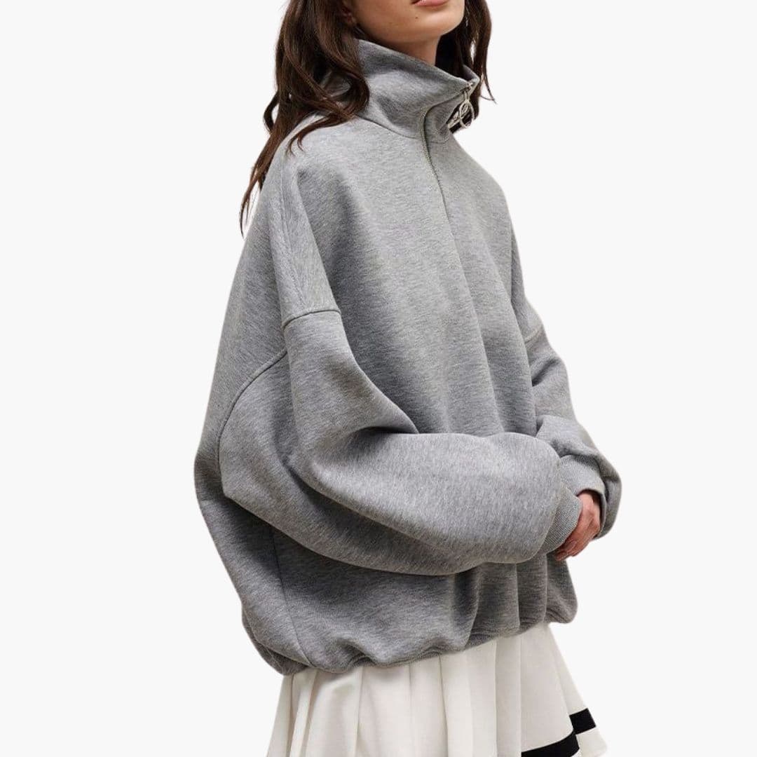 Pull femme à col montant et fermeture zippée