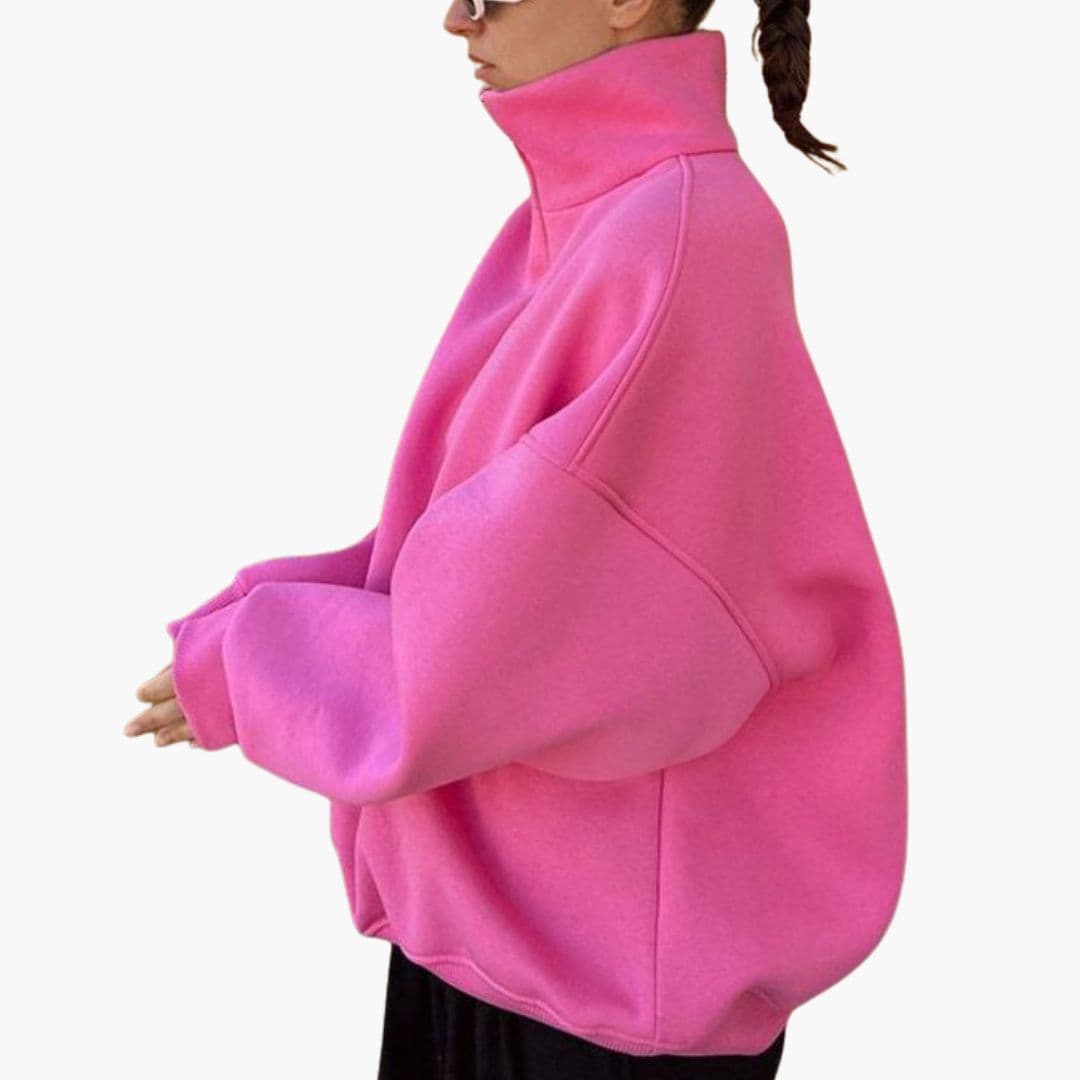 Pull femme à col montant et fermeture zippée