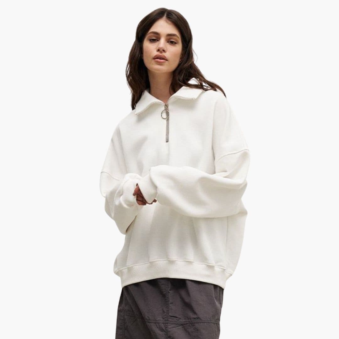 Pull femme à col montant et fermeture zippée