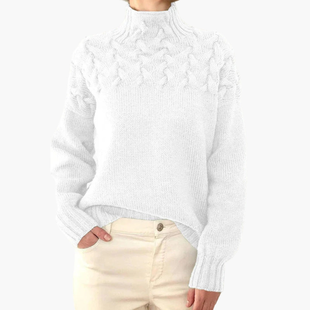 Pull femme à col montant et maille torsadée