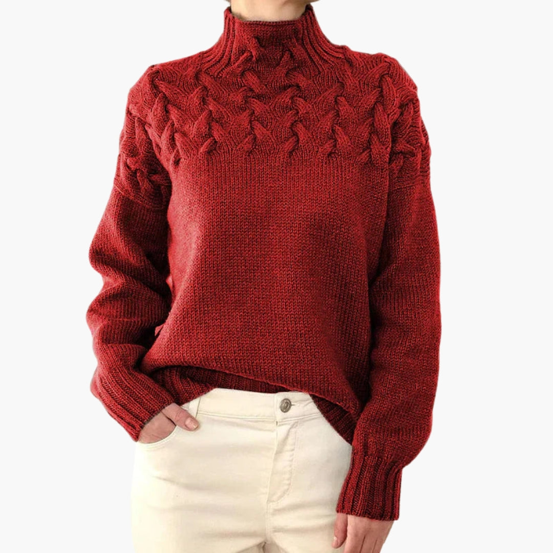Pull femme à col montant et maille torsadée
