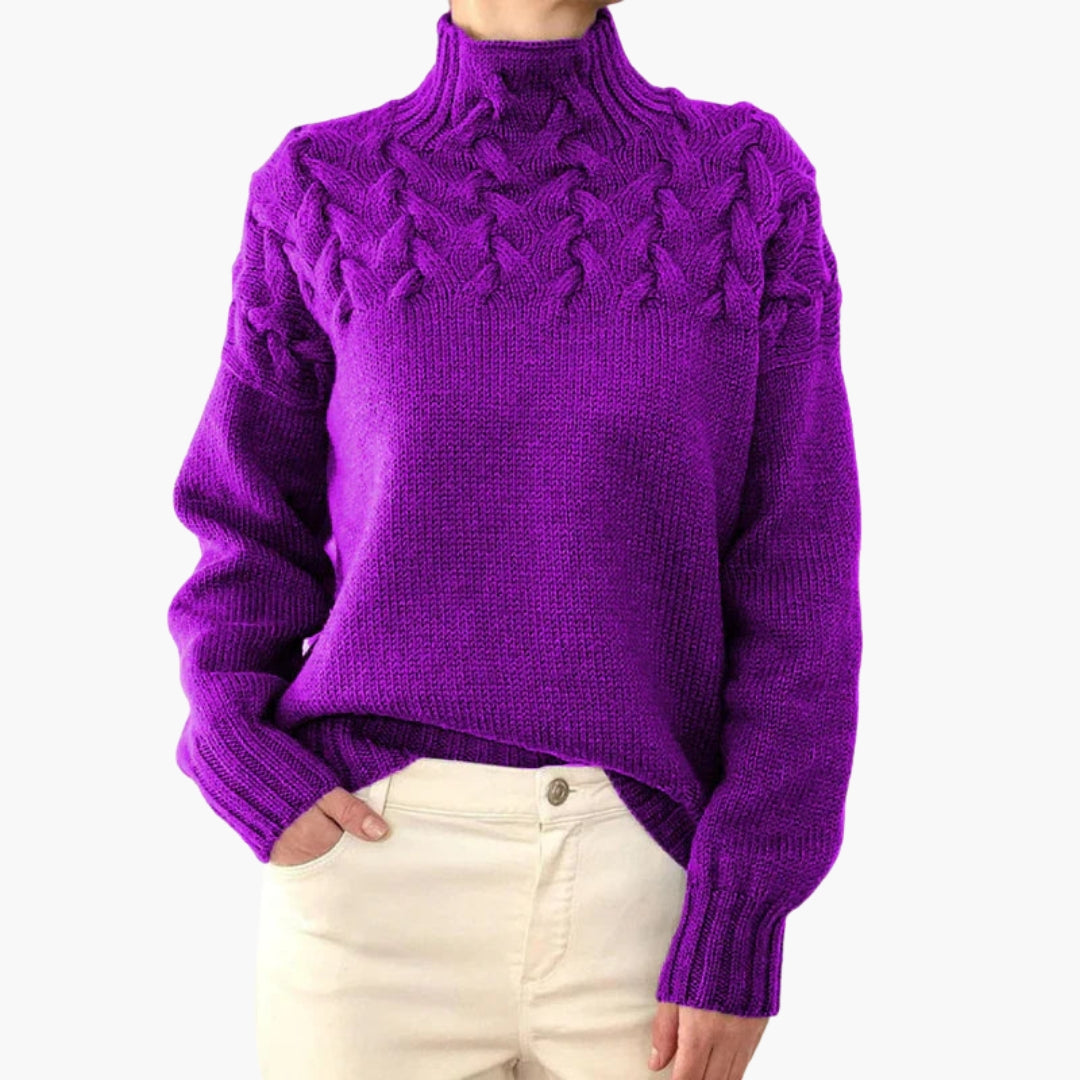 Pull femme à col montant et maille torsadée