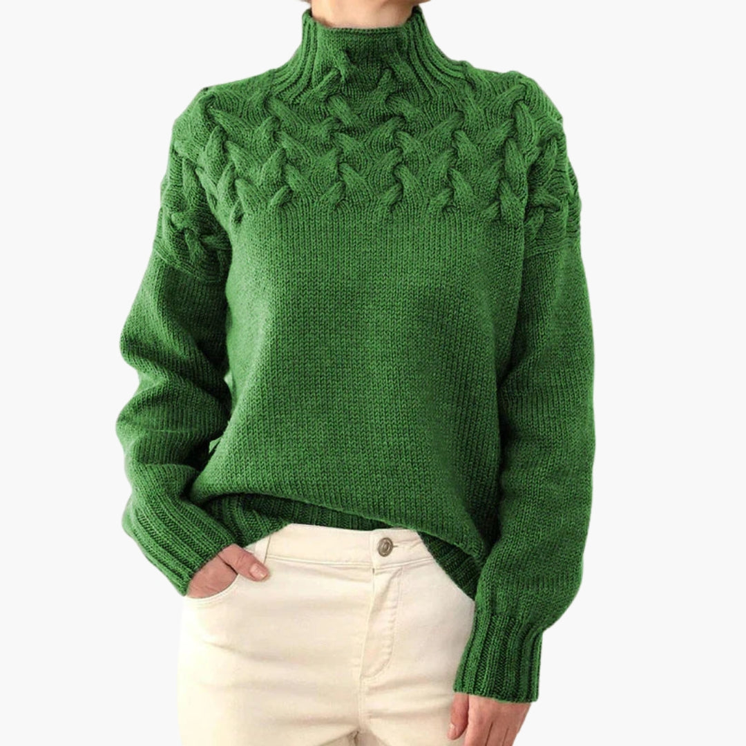Pull femme à col montant et maille torsadée
