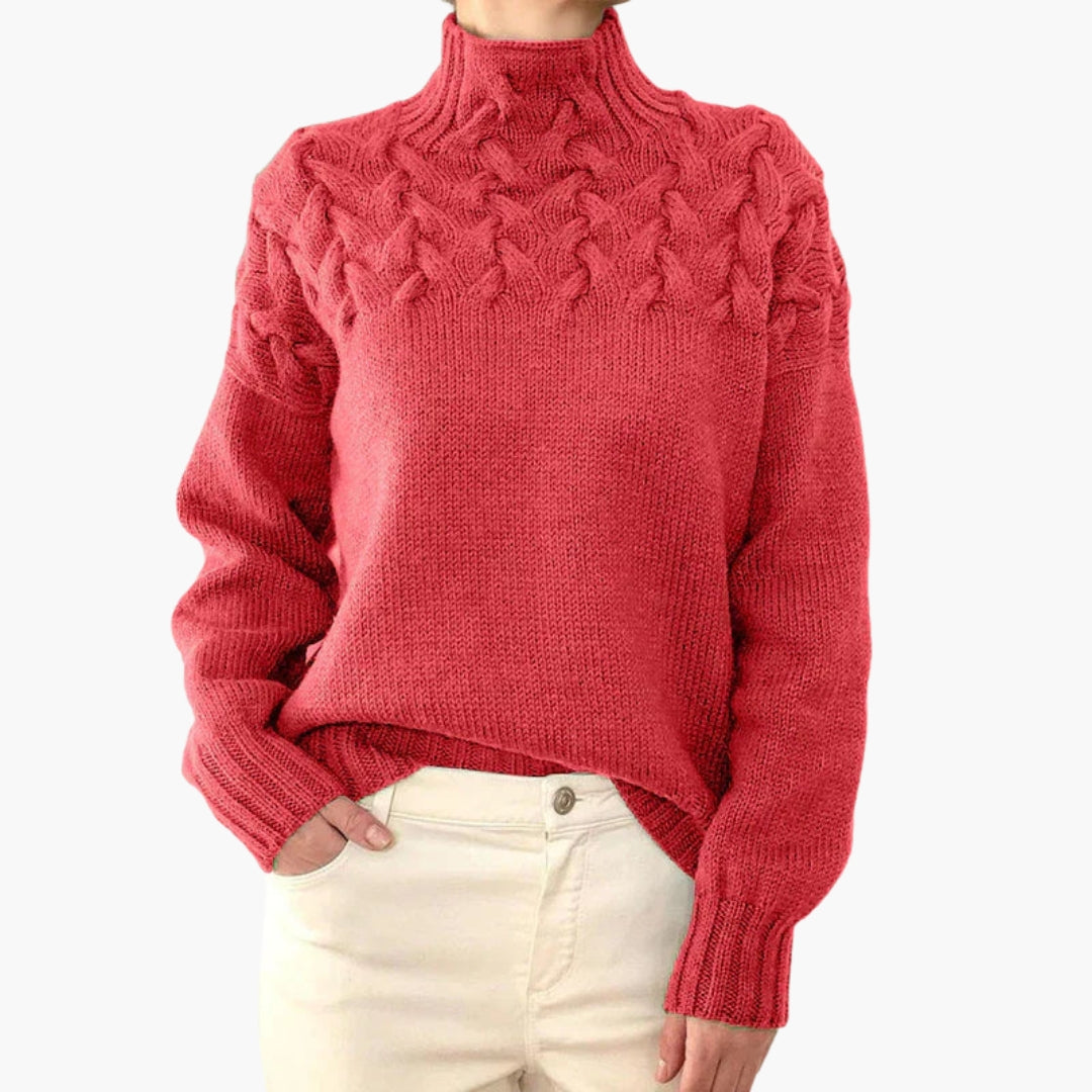 Pull femme à col montant et maille torsadée