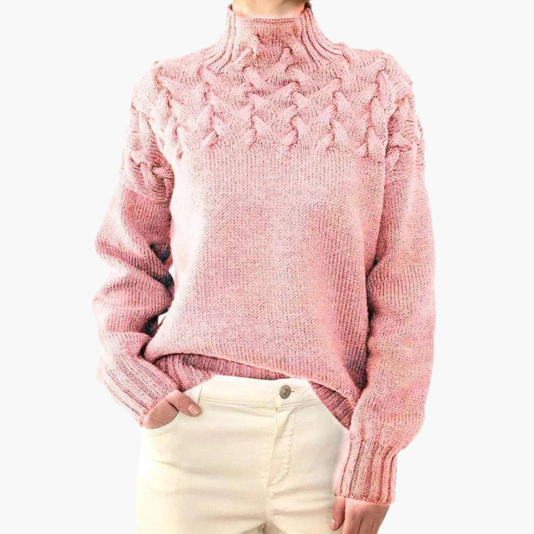 Pull femme à col montant et maille torsadée