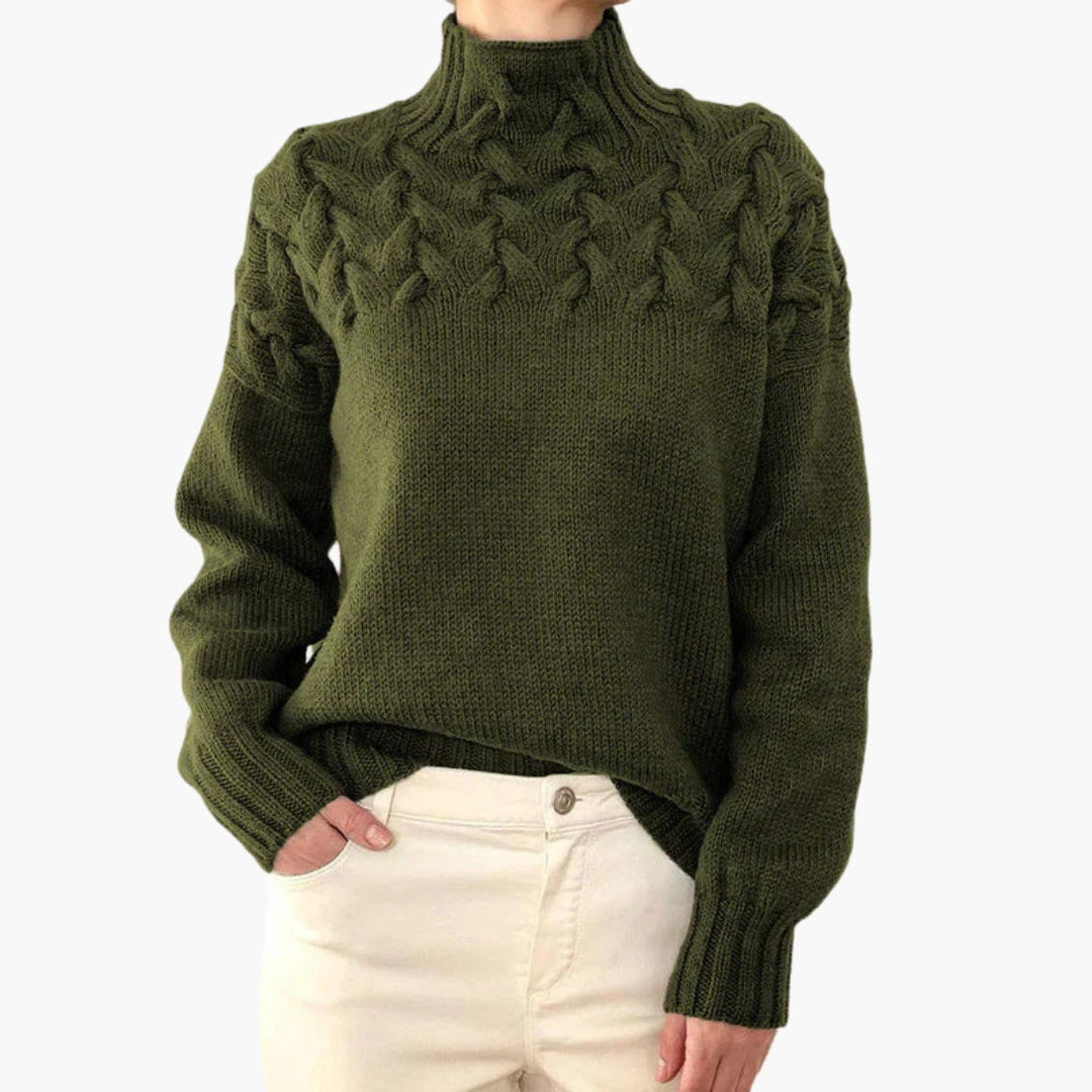 Pull femme à col montant et maille torsadée