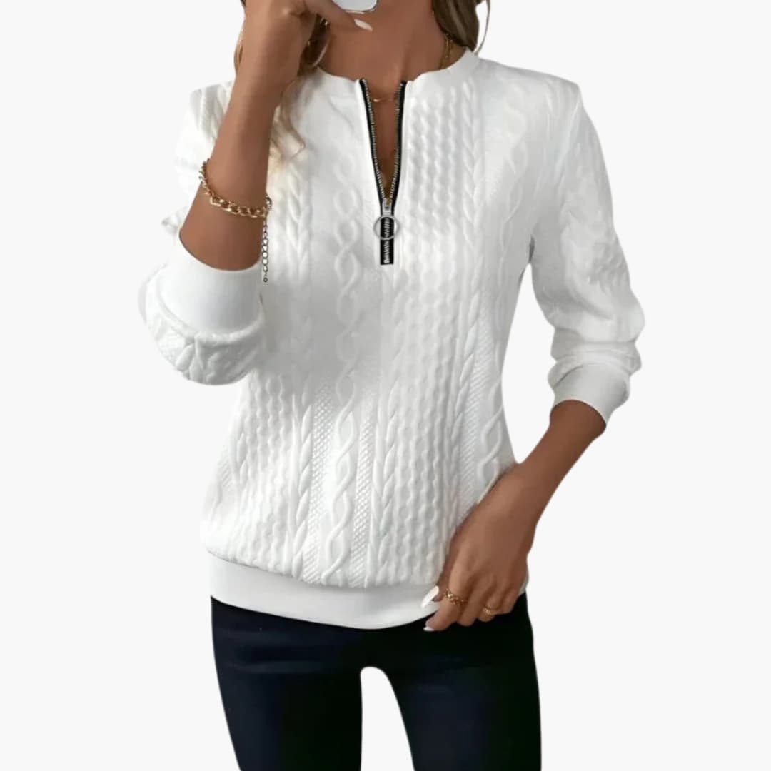 Pull femme à col zippé et maille torsadée