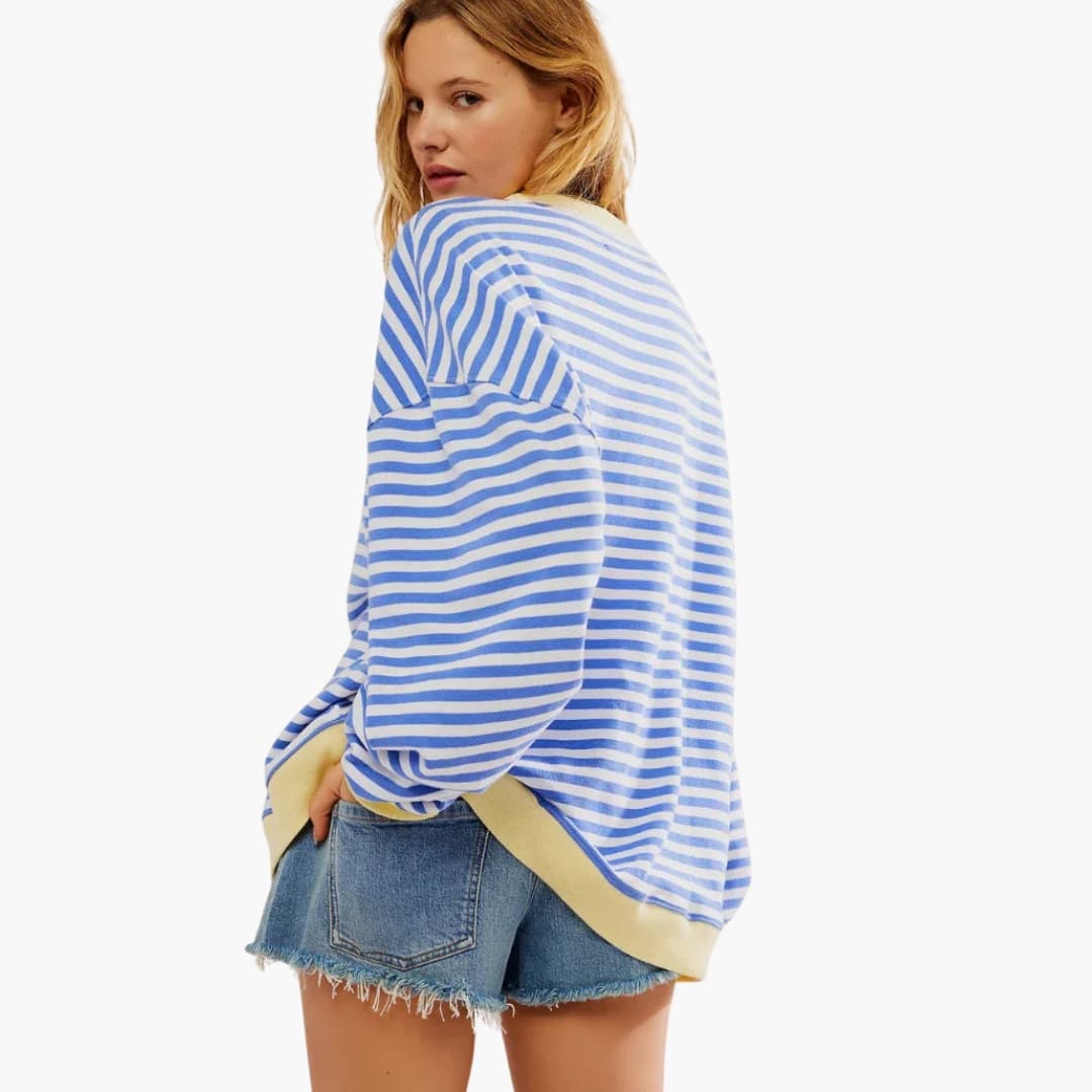 Suéter de mujer a rayas con acabados en contraste y corte amplio