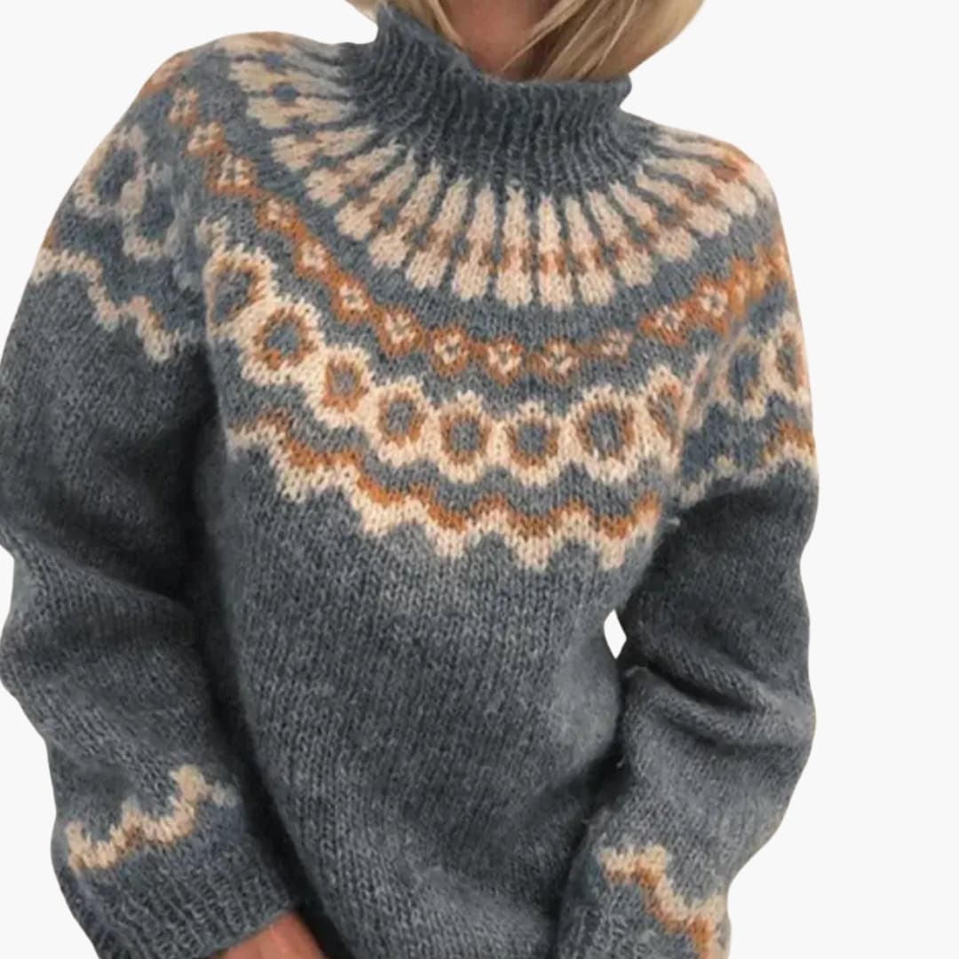 Pull femme avec col montant et maille à motifs