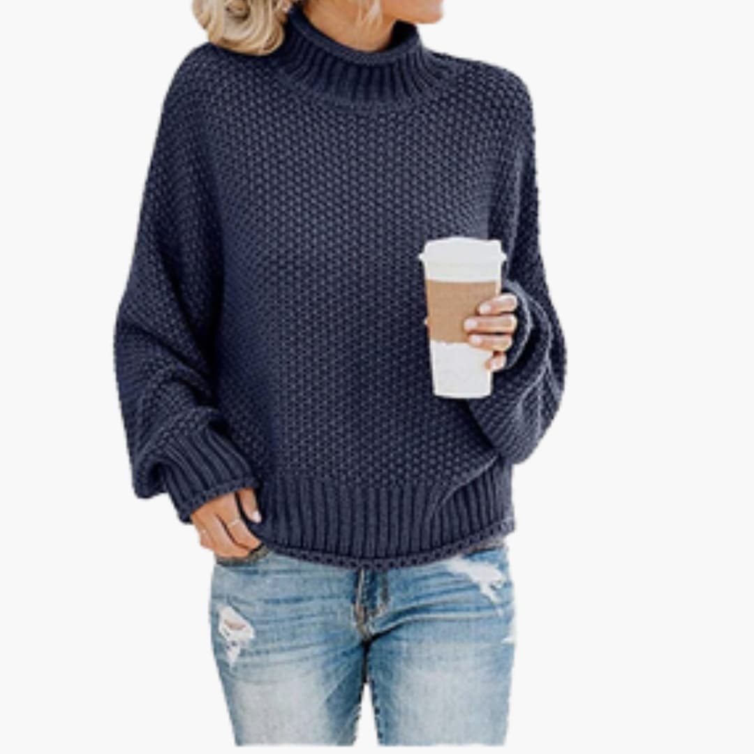 Pull femme avec col montant et surface côtelée